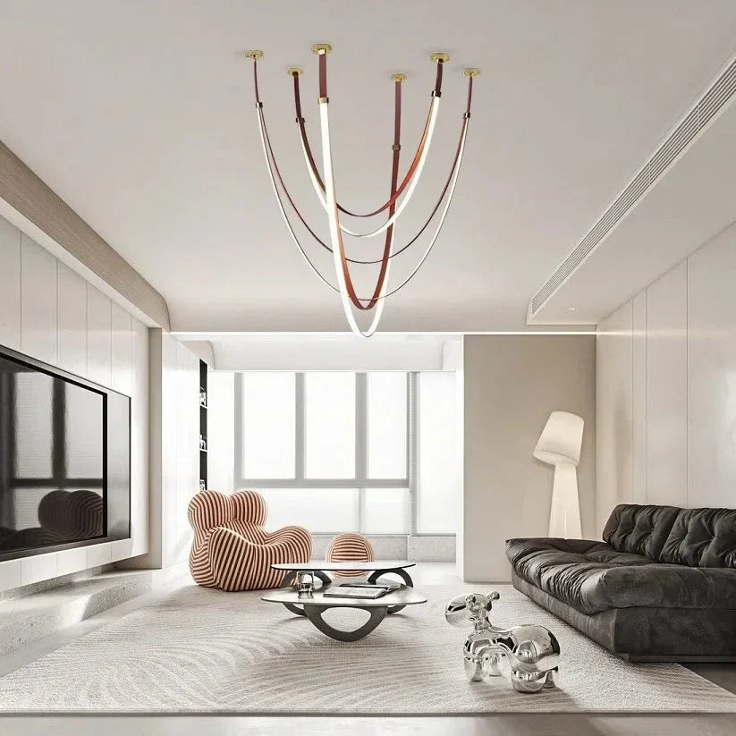 Lampada a sospensione Beza in pelle con LED dimmerabile, design moderno scultoreo