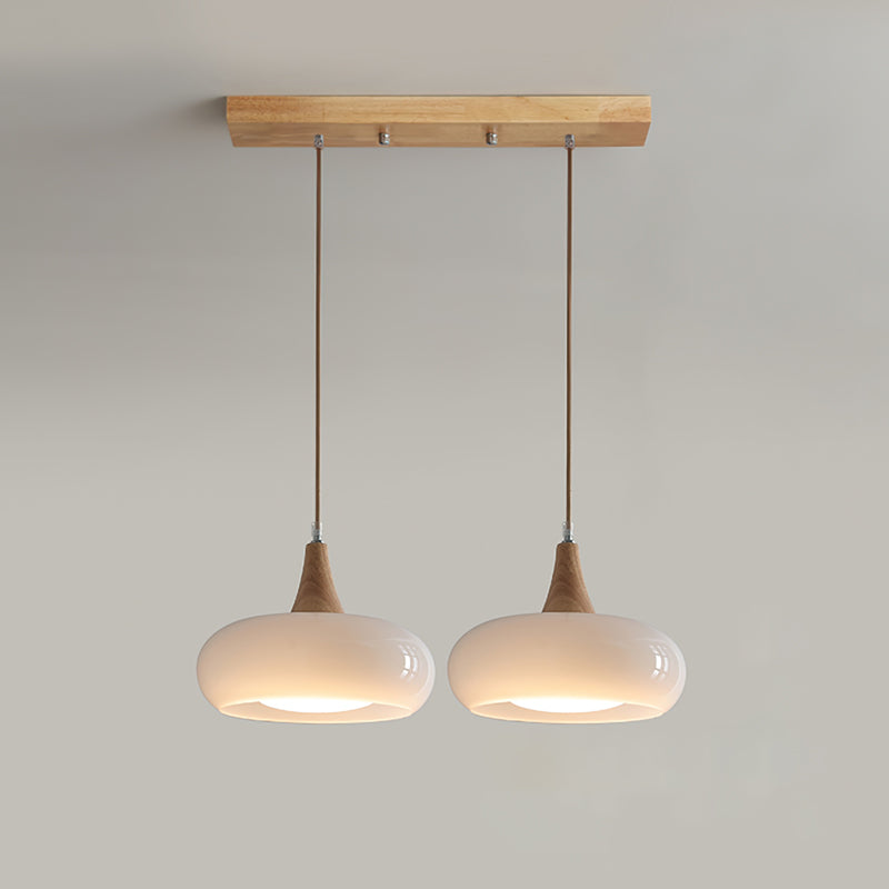 Lampada a sospensione in vetro ambra e legno mid century per isola cucina