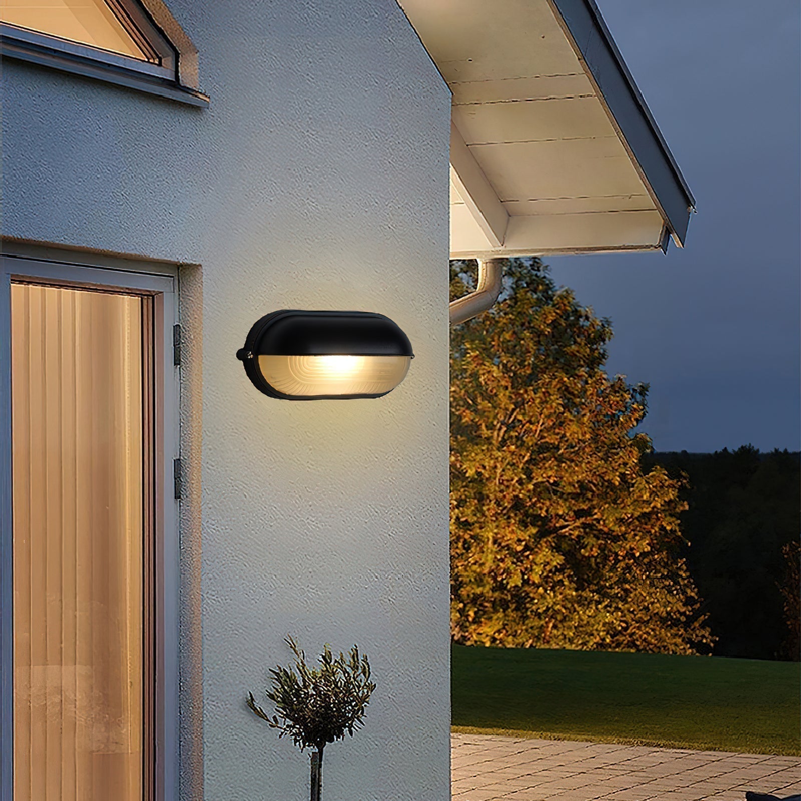 Lampada da parete per esterni ovale in vetro rigato nera, stile industriale navale