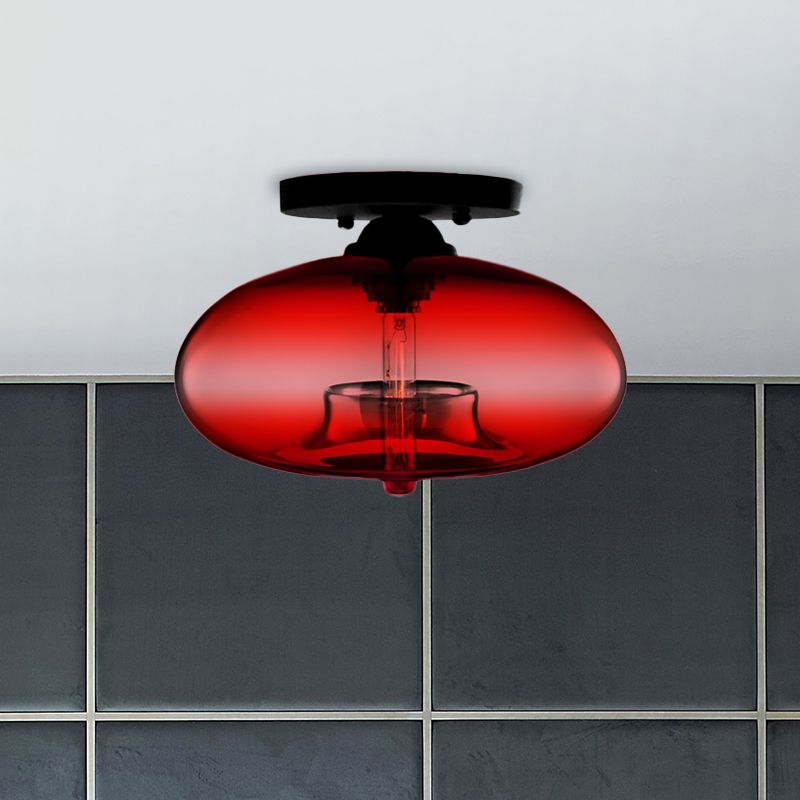 Plafoniera a soffitto ovale in vetro colorato con struttura in metallo nero art deco
