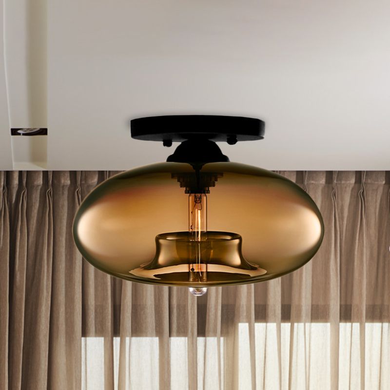 Plafoniera a soffitto ovale in vetro colorato con struttura in metallo nero art deco