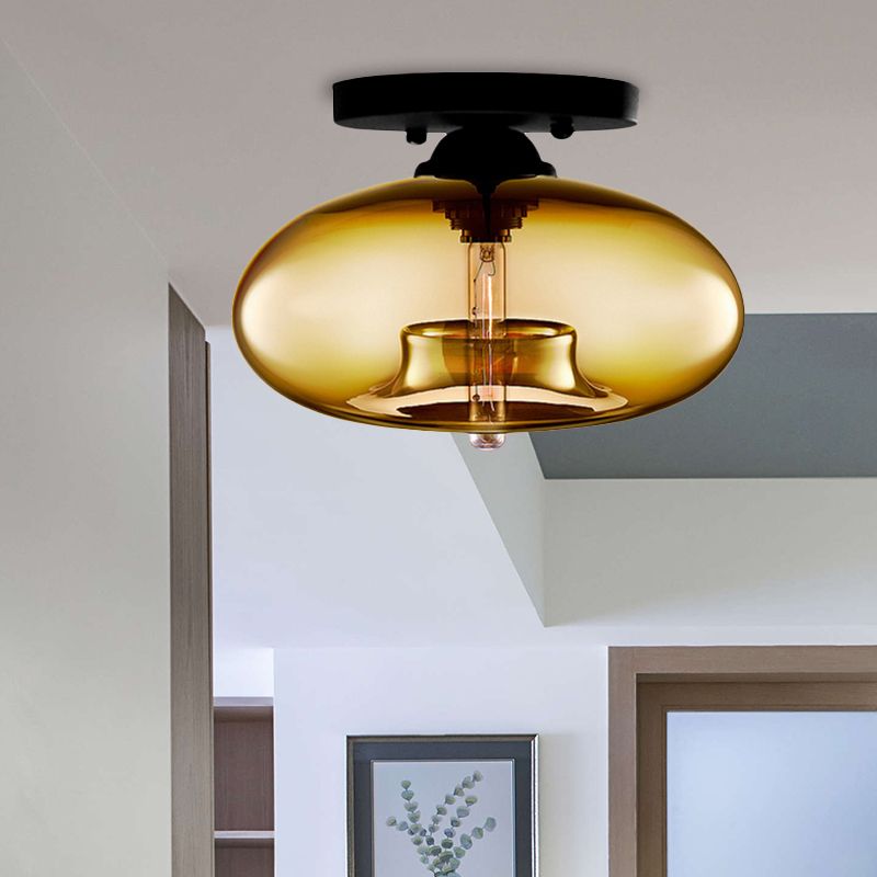 Plafoniera a soffitto ovale in vetro colorato con struttura in metallo nero art deco