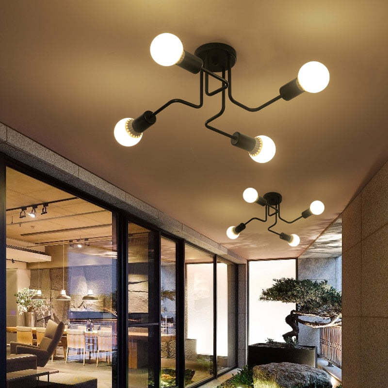 Plafoniera sputnik in metallo nero a più bracci con lampadine a vista, industriale mid century