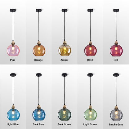 Lampada a sospensione a globo in vetro ondulato colorato con paralume testurizzato oro
