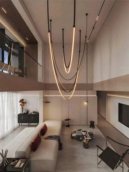 Lampada a sospensione Beza in pelle con LED dimmerabile, design moderno scultoreo