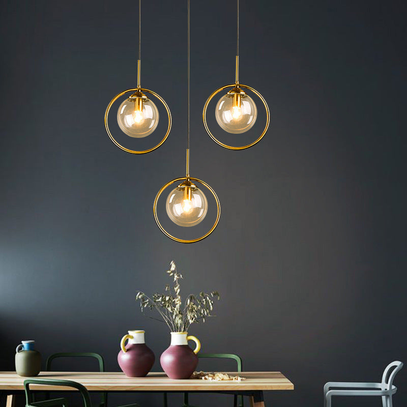 Lampada a sospensione con globo in vetro e anello in metallo, vetro colorato, dimmerabile
