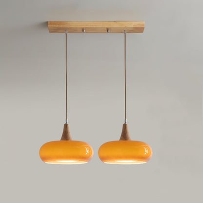 Lampada a sospensione in vetro ambra e legno mid century per isola cucina