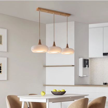 Lampada a sospensione in vetro ambra e legno mid century per isola cucina