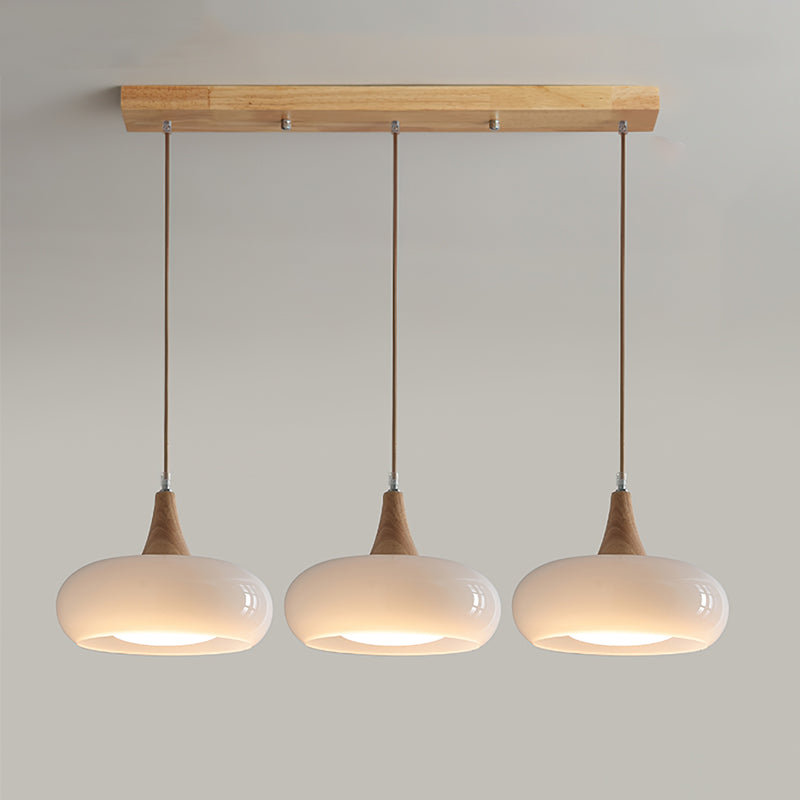 Lampada a sospensione in vetro ambra e legno mid century per isola cucina