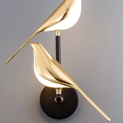 Lampada da parete a silhouette di uccello color oro, applique moderna