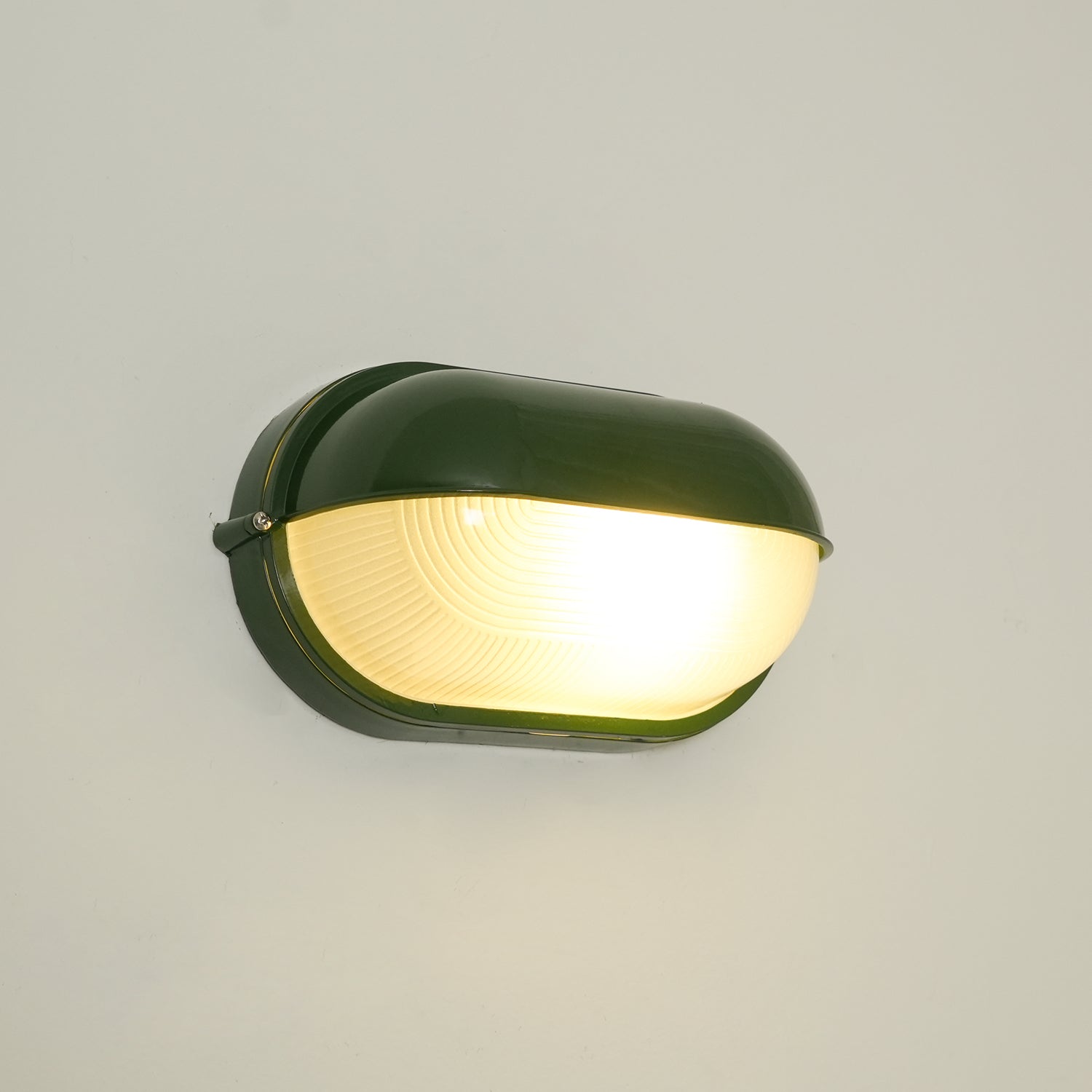 Lampada da parete per esterni ovale in vetro rigato nera, stile industriale navale