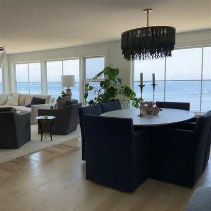 Lampadario boho in perle di legno con paralume a tamburo
