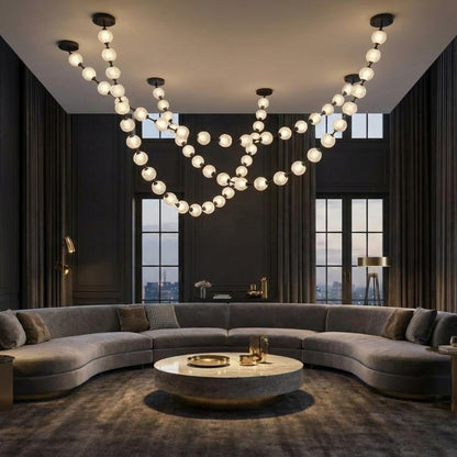 Lampadario moderno Esle a collana di perle in vetro trasparente