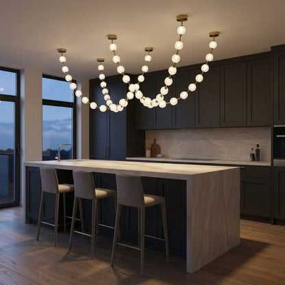 Lampadario moderno Esle a collana di perle in vetro trasparente