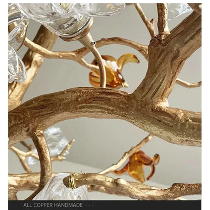 Lampadario scultoreo a rami Asut in rame con fiori in vetro