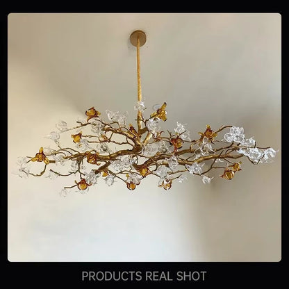 Lampadario scultoreo a rami Asut in rame con fiori in vetro