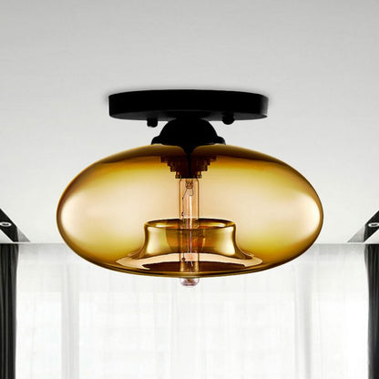 Plafoniera a soffitto ovale in vetro colorato con struttura in metallo nero art deco