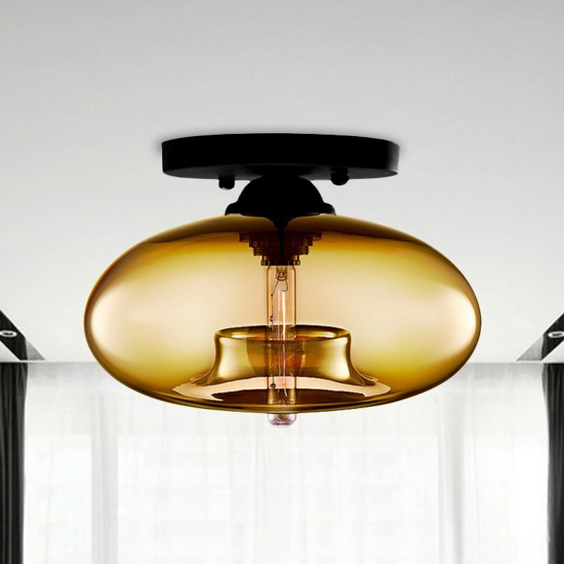 Plafoniera a soffitto ovale in vetro colorato con struttura in metallo nero art deco