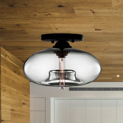 Plafoniera a soffitto ovale in vetro colorato con struttura in metallo nero art deco