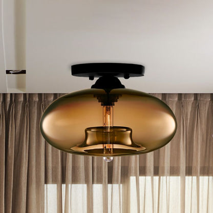 Plafoniera a soffitto ovale in vetro colorato con struttura in metallo nero art deco