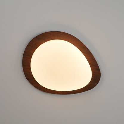 Plafoniera LED japandi a ciottolo con venatura del legno noce