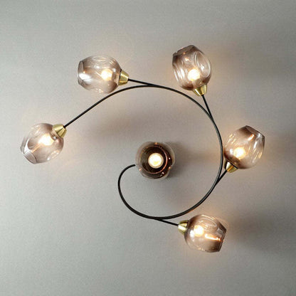 Semi plafoniera a grappolo con globi in vetro, metallo nero e oro a più luci