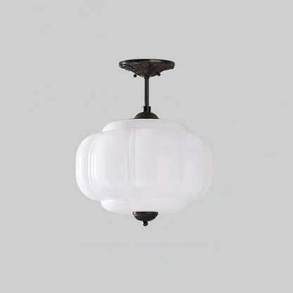 Semi plafoniera in vetro verde con globo rigato e finitura oro, stile vintage